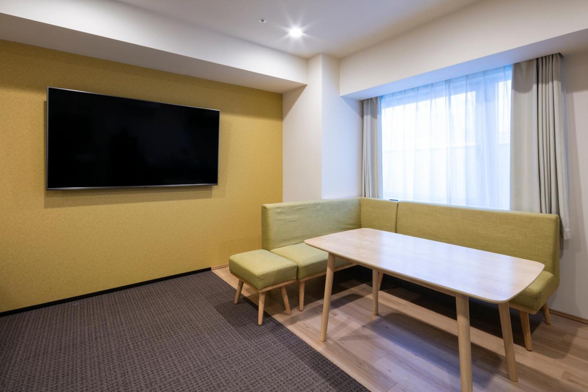 Randor Hotel Sapporo Suites Номер фото A living room at a typical apartment