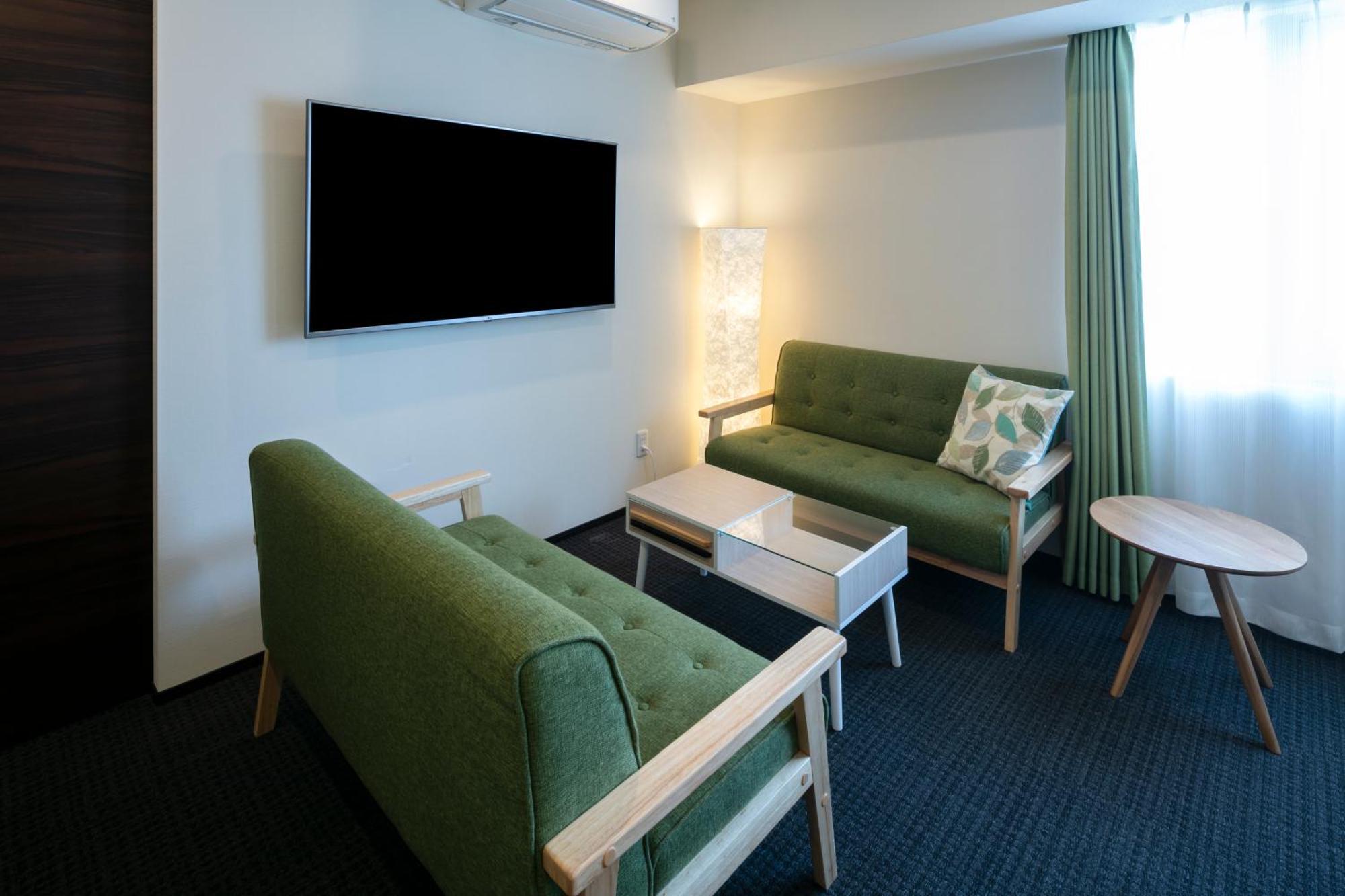 Randor Hotel Sapporo Suites Номер фото A room at the hotel