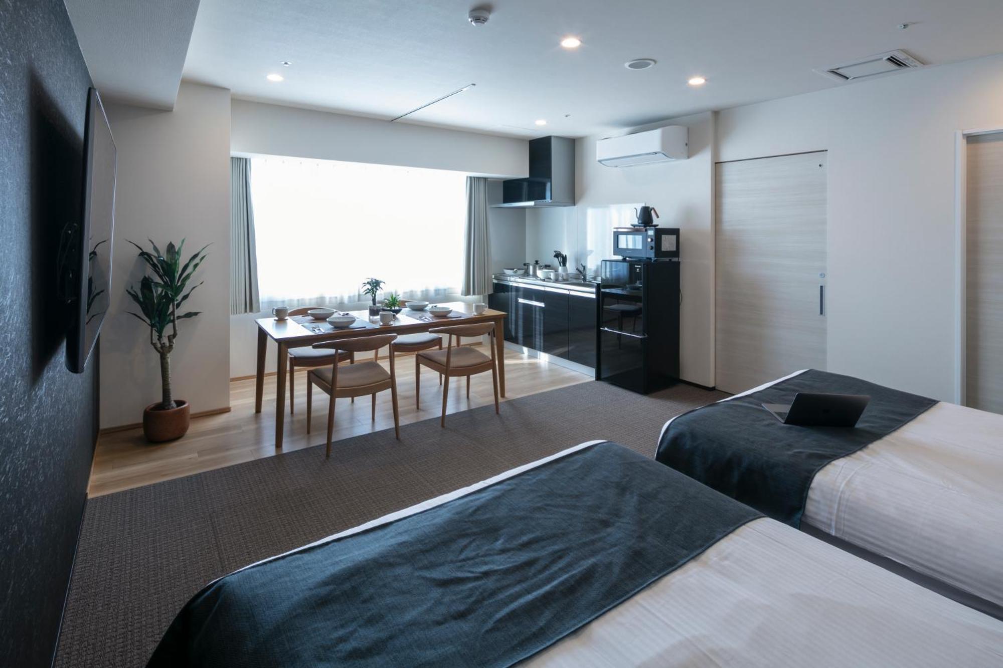 Randor Hotel Sapporo Suites Номер фото A typical studio apartment in Japan