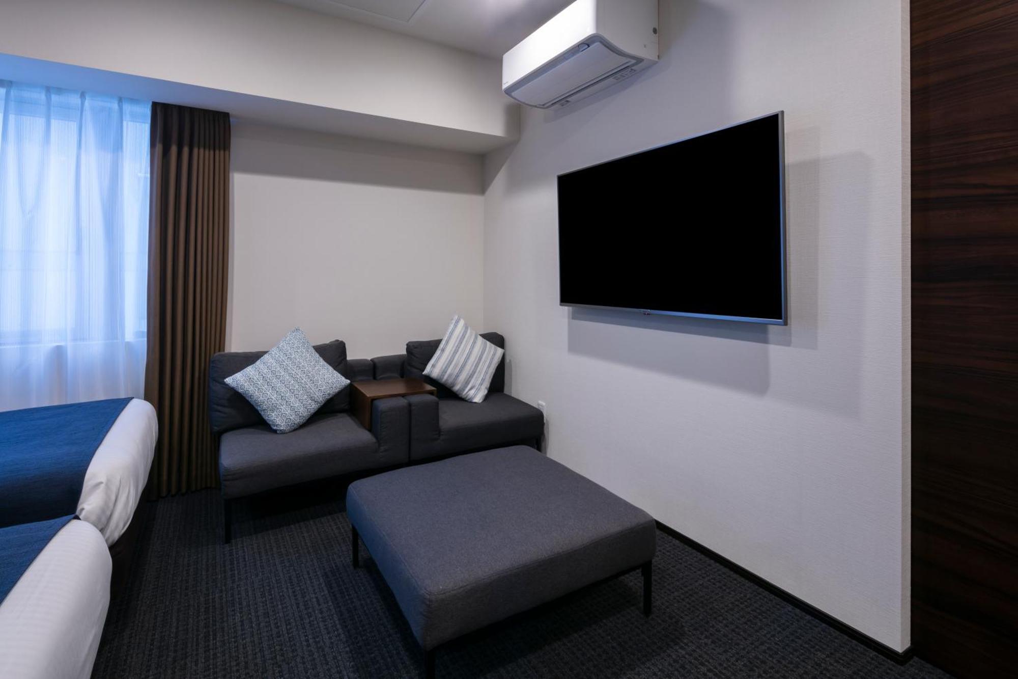 Randor Hotel Sapporo Suites Номер фото A room at the hotel
