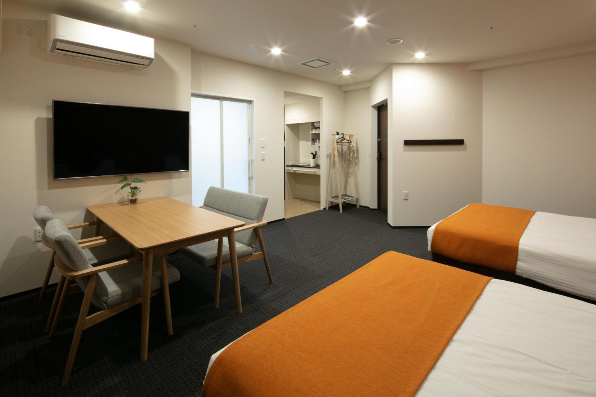 Randor Hotel Sapporo Suites Номер фото A typical room at the hotel